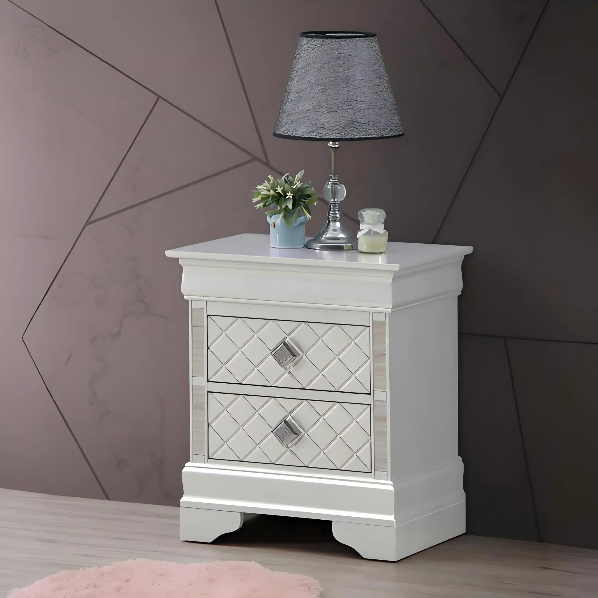 Silver nightstand with drawers in champagne finish with diamond pattern