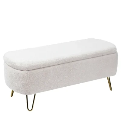 Ivory white storage ottoman with faux fur upholstery and gold metal legs, perfect as a footstool or bench with hidden storage