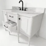 The bathroom vanity from a side angle, showing the plywood cabinet with ornate handles and a marble countertop.