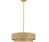 Woven rattan ceiling light in a modern boho living room with warm glow