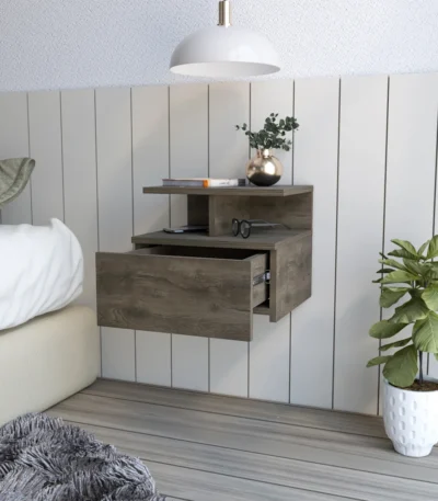 Dark walnut floating nightstand one drawer wall-mounted beside a bed in a modern bedroom