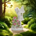 Close-up of the fairy statue's delicate wings and solar panel on its base.