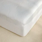 Modern all-in-one bed frame with box spring in cool-touch fabric, featuring motion isolation for undisturbed sleep