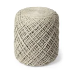 Goldoma 16 inch ivory cylinder pouf ottoman as contemporary seating in living room