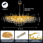 Modern crystal chandelier hanging in a dining room with gold finish and tree branch design