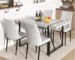 Modern dining table small rectangular gray wood with four chairs in a cozy dining room