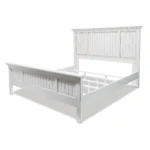 Goldoma white carved geometric distressed solid wood king bed frame in bedroom