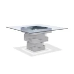 Modern 59-inch square glass dining table with gray solid wood pedestal base, positioned in a dining room