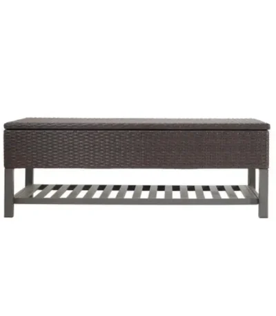 Goldoma Regent storage bench with metal rack featuring woven rattan top and black metal frame in entryway