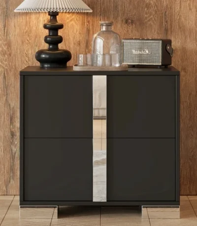 Modern mirrored nightstand with two drawers and metal feet in a bedroom setting