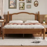 Modern teak finish full size bed with fabric upholstered headboard in a bedroom setting