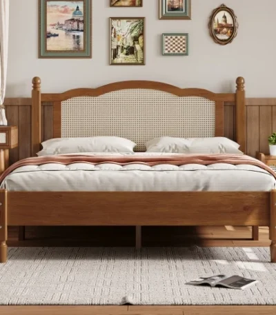 Modern teak finish full size bed with fabric upholstered headboard in a bedroom setting