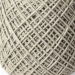 Goldoma 16 inch ivory cylinder pouf ottoman as contemporary seating in living room