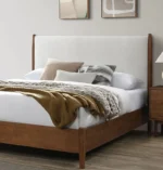 Adjustable full size bed with walnut panel headboard and beige upholstery featuring diamond crystal design and oak slat support