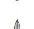 HMS contemporary bronze hanging light with ribbed pebbled glass shade in warm white, suspended over a wooden dining