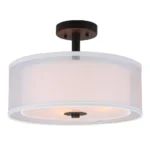 Ceiling light illuminating a cozy living room corner, soft warm glow on a beige sofa and rug.
