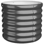 Large anthracite powder-coated steel garden planter on a patio floor, filled with lush green plants, side view showing