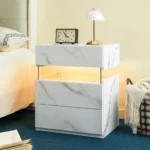LED nightstand 3 drawer with white stone acrylic finish, featuring three storage drawers and ambient LED lighting.