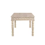 Goldoma 60 inch white solid wood dining table with distressed finish in a modern farmhouse dining room