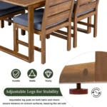 Modern acacia wood dining set with four chairs and adjustable legs on a backyard patio