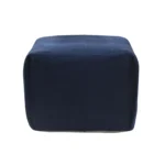 Blue cotton patchwork pouf ottoman by Goldoma – foldable foot stool with tufted design in a living room