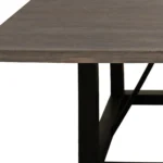 Goldoma 60-inch solid wood square dining table with dark brown distressed top and black iron legs in a rustic dining room
