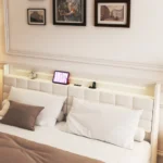 King floating bed frame with LED lighting and charging station in a modern bedroom