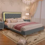 Queen bed frame with charging ports featuring an adjustable velvet wingback headboard in a modern bedroom