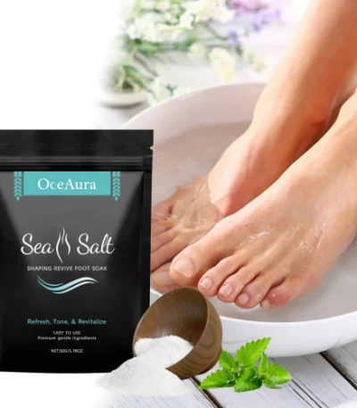 Goldoma OceAura Sea Soak foot bath salt in a glass jar with wooden lid on a bamboo tray