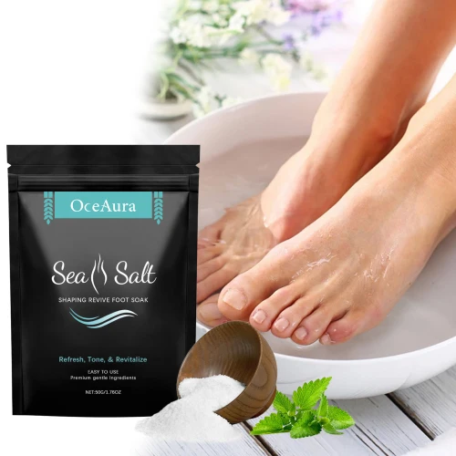 Goldoma OceAura Sea Soak foot bath salt in a glass jar with wooden lid on a bamboo tray