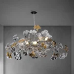 Modern black rectangle chandelier with ginkgo leaves in a dining room