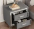 Mid century nightstand with velvet drawers in a cozy bedroom setting