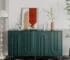 Modern green sideboard cabinet with four doors in a living room setting