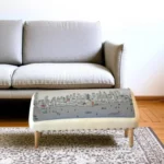 Goldoma 38 inch cream wool and brown leather foldable ottoman with nailhead trim