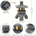Solar pagoda lantern garden statue with gray stone finish and warm LED glow