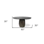 Round wood dining table in brown solid wood with pedestal base in a modern dining room