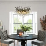 Modern black crystal chandelier with tree branch design in a living room