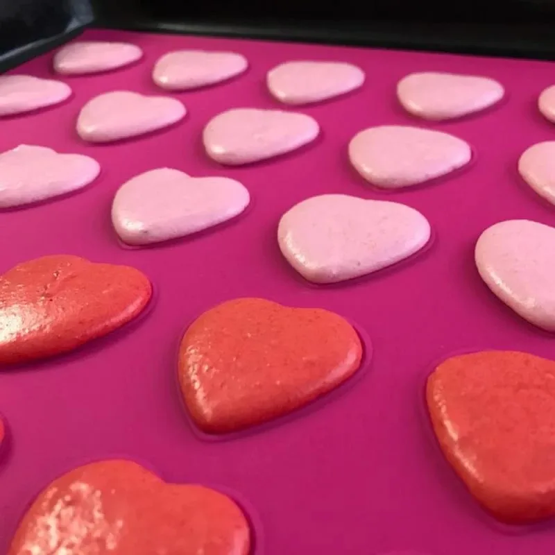 Hcc60dbe69b4a471a8130a853073ca7a32.webp Hearts Shape Silicone Macaron Mold Non-Stick Muffin Oven Pad DIY Baking Mold Mat DIY Bakeware Cake Making Tools - Image 1