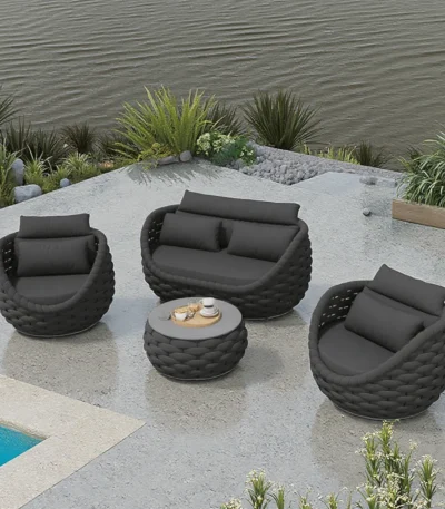 Modern outdoor sofa set with cushions on a garden patio