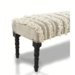 Goldoma 47-inch cream boho stripe upholstered bench with black metal legs in a living room setting