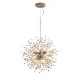 Wide shot of the dandelion chandelier in a kitchen, with natural light from a window highlighting its organic form.