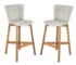 Set of two adjustable outdoor bar stools in teak wood and light grey wicker on a patio