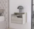 Floating nightstand with drawer and dual shelf display in a modern bedroom