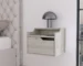 Floating nightstand with drawer and dual shelf display in a modern bedroom