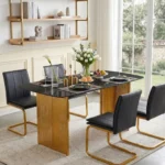 Modern glass dining table set with marble pattern and gold metal legs in a dining room setting