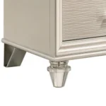 Goldoma traditional 2-drawer nightstand with diamond clear acrylic legs in pearl white finish placed next to a bed