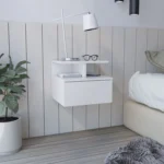 White floating nightstand with one drawer wall mounted in a modern bedroom