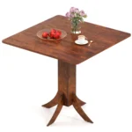 Walnut square dining table with pedestal base in a modern dining room setting
