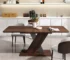 Modern expandable marble top dining table in a bright dining room with chairs