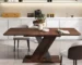 Modern expandable marble top dining table in a bright dining room with chairs
